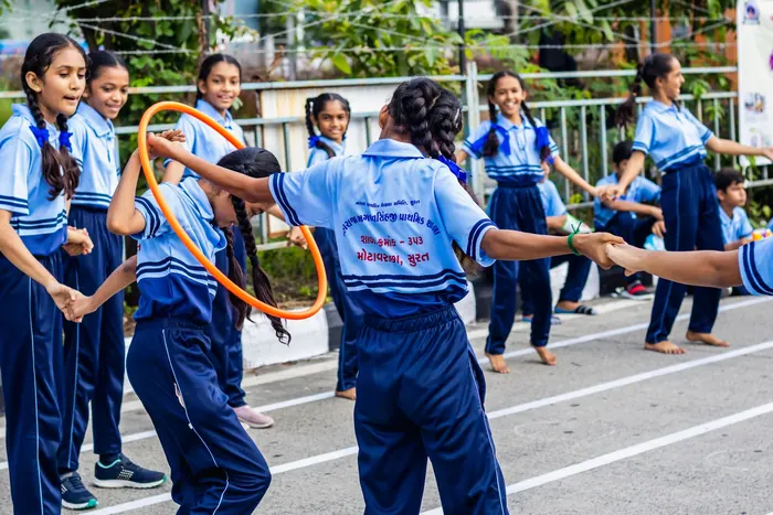 Students playing a group game outdoors
